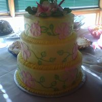 Retirement Cake Gum paste hibiscus and B/c icing. bottom layer was coconut cake with coconutcream filling. other two layers were pinapple cake with...