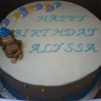 Monkey Cake fondant monkey, cream cheese frosting. french vanilla cake with stawberry cream cheese filling. i was happy with the monkey but unhappy...