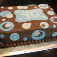 Blue Dots This is a small 2 layer sheet cake...peanut butter cake flavor w/ peanut butter filling. This was for my neighbors' husband's...