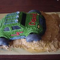 4 Wheelin' I made this cake using a VW Beetle pan for the car...all iced in buttercream. The tires were small doughnuts cut in half and covered in...