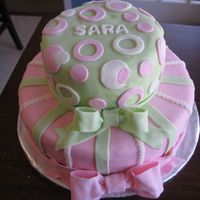 Pink And Green Circles And Stripes This is a 2 tiered birthday cake I did for my 7 yr old daughter. Bottom tier is 10" round and top is a 6" round. All is covered...
