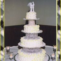 Daisies For Holly This was my first ever wedding cake...I just finished the Wilton Courses and a month later was my daughters wedding.