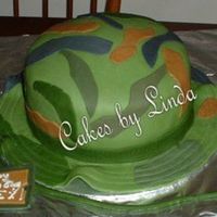 Camohatpost.jpg This is what I ended up with for the 12yr. old boy...He was thrilled.. My first MMF cake..Thanks for looking.