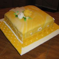 Course "iv" Final View 1 Lemon-poppy seed cake with lemon flavored fondant. I did each of the four sides with different elements we learned in class for practice....