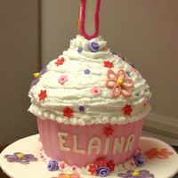 Cupcake Shape Cake Big cupcake for birthday girl. Vanilla cake made with yellow squash. Buttercream on top, MMF on bottom with MMF accents. Number 1 is a...