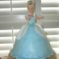 Cinderella Cake first 3D cake. I got help from my wilton instructor. she let me borrow her dome pan which was much bigger than the one wilton sells. cake...