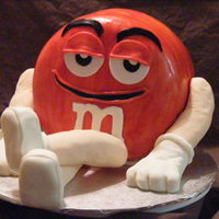 Red M&m For my DS's b/d. He loves M&Ms and Red is his favorite character. Devil's Food Cake, White chocolate fondant, RKT arms and...