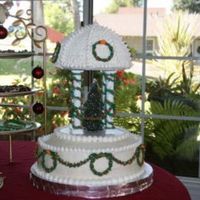 My Christmas Gazebo My first tiered cake. I ran out of time and wasn't able to make the gumpaste bows for the wreaths I had planned. Darn. I think that...
