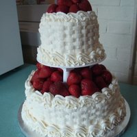 Basket Of Berries My first attempt at basketweave was for this informal wedding cake. Strawberry cake with vanilla buttercream and fresh strawberries.