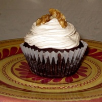 Chocolate Coffee Explosion Cupcakes This is a chocolate chocolate chip cupcake, with an intensely coffee flavored whipped cream icing, garnished with walnuts. It is Kosher for...