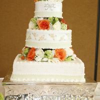 My Wedding Cake This cake was made by Linda Brown Cakes of Lakeland, FL. 12" square, 9" round in chocolate and vanilla, 6" round lemon...