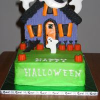 Haunted House Halloween cake for a co-worker's daughter's school fundraiser. Vanilla cake w/ vanilla buttercream. I wanted to add more detail,...