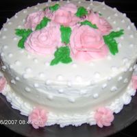 First Cake With Roses Roses made out of buttercream frosting. Strawberry cake with cream cheese filling.