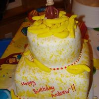 Curious George With Bananas cake for my son's 2nd birthday. had to use a plastic monkey :( my poor kids never get as cool a cake as other kids...too much to do...