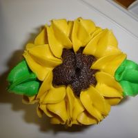 Close Up Of Cupcake This is a close up of one of my cupcakes- it's my favorite. I think it looks like a sunflower or brown-eyed susan.