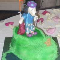 Golfing Snoopy Thanks to everyone that helped get me through this Snoopy cake! I wasn't happy with his face the first time around but after a few...