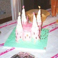 Castle Pink castle. Didn't want a smooth look with the BC so buffed it up a little. Piped vines and flowers growing up walls. Turrets made...