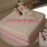 Gumpaste Roses I made the gumpaste flores for this cake I hope they came out good....Vanilla cake with italian white chocolate buttercream.