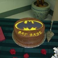 Bat Babe Chocolate cake with chocolate buttercream frosting. Batman logo is gumpaste.