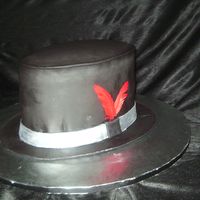 Top Hat This is a 3 layers - 1 white, 1 Butter Pecan both with Butter Cream and 1 Strawberry w/Strawberry Cream Cheese. Each layer has a card board...