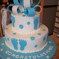 Boy Baby Shower Cake 10" & 6" chocolate chip cherry cake and yellow cake alternating in both tiers with chocolate ganache and cherry fillings....