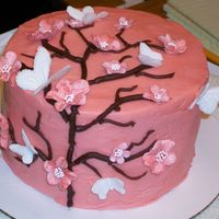 Butterfly & Vine Fondant butterflies covered in edible glitter. Fondant flowers painted with coloring the cake is chocolate with vanilla buttercream icing...