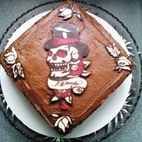 Ed Hardy Cake Ed Hardy Chocolate transfer, chocolate cake with a heath bar buttercream filling.