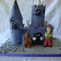 Scooby Doo & Saggy Both towers has rice crispies inside. Scooby and Saggy are made from modeling paste.