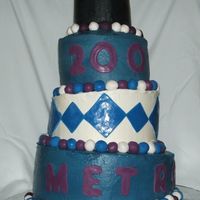 Graduaction Cake bc and fondant accents first time trying topsy turvy