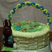 Easter Cake It is a butter cake with butter cream frosting. The grass is edible easter grass (Imported from Germany). The eggs are candy. You can eat...