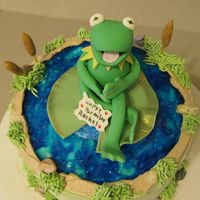 Kermit The Frog On Is Pond This is a 6" choc cake with Gumpast/fondant Kermit and Lily pad. Cat Tails are also gumpast/fondant. I did this for a client .