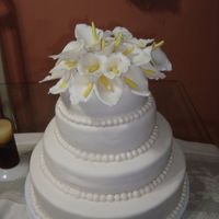 My 1St Wedding Cake oh its not perfect but i love it its simple and i did the calla lillies mysself thanks to edna's tutorial! thanks soo much i was soo...