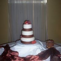Another View, Simple Cake bride also ordered a birthday cake for her cousin who's birthday was the same day as her wedding. It was very cute, after they cut the...