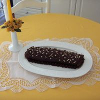 Brazo De S, Carlos Este brazo de gitano est&aacute; relleno de crema, cubierto de frosting de chocolate.Lo hice para celebrar el santo de mi marido.Est&...