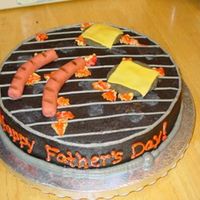 Father's Day Bbq! This was my first attempt at doing anything with fondant! This is a yellow cake with fudge filling, frosted with chocolate buttercream. The...