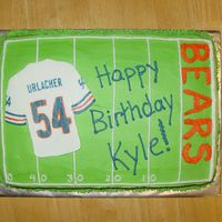 Urlacher Birthday Cake This is a cinnamon swirl cake with buttercream frosting. The Urlacher jersey is a frozen buttercream transfer. The rest of it is freehand....