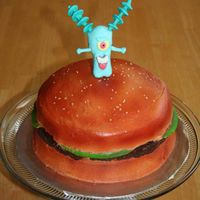 Plankton's Revenge My son's birthday cake modeled after an aquarium ornament. Plankton and lettuce are MMF the rest is buttercream.