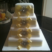 First Square Wedding Cake This wedding cake was very easy to make, but love the outcome..simple but stunning thanks to the brooches!