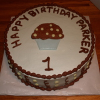 Blue And Brown Birthday Cake and cookies made to match graphics for a little boy's 1st birthday.