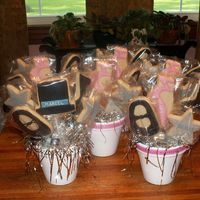 Dance Recital Six Cookie bouquets -- 5 girls and 1 boy -- his had the top hat and their's had the ballet slippers. Sugar cookies, all royal.