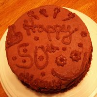 Dad's 50Th Cake baked by me and decorated by my 14-yr-old daughter for her dad. I thought she did a pretty good job without any interference from me...