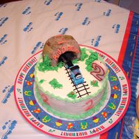 Small Train Cake For Family Party Same thing as my big Thomas cake, but a smaller scale for a separate, smaller family birthday party. I used the same tunnel from the bigger...
