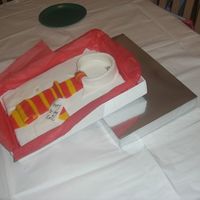 Shirt Cake 2Nd View Showing Box This is a view of my first Shirt Cake that shows it from far away with box lid that I used to cover the cake with on the bottom as a prop....