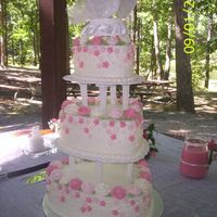 My First Wedding Cake Heart shaped tiers with pink flowers.
