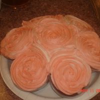 First Cupcake Bouquet First bouquet. I used 3 1/4 oz cups and instead of using 19 cups I used 7. To make a smaller bouquet.