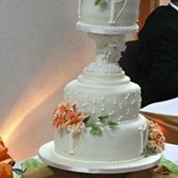 Musical Whimsy The bottom and top cakes are fruit cakes, the middle is sponge. Never use a sponge as a middle cake. I caught my royal.....I was having...