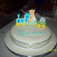 Choo Choo Teddy This is a christening cake I did. It's sponge cake is covered in fondant. The inspiration for this cake was from a cake book I have. I...