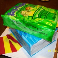 Harry Potter The books are chocolate cake covered in fondant. I painted the book cover using gel food coloring mixed with clear vanilla.