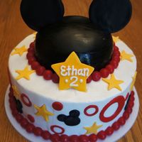 Mickey Mouse Hat Cake MM hat and accents made out of fondant. The white is buttercream. Red ball border is actually cherry candies rather than fondant. Turned...