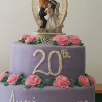 20Th Anniversary The customer wanted a double layer, lavendar cake with pink roses.